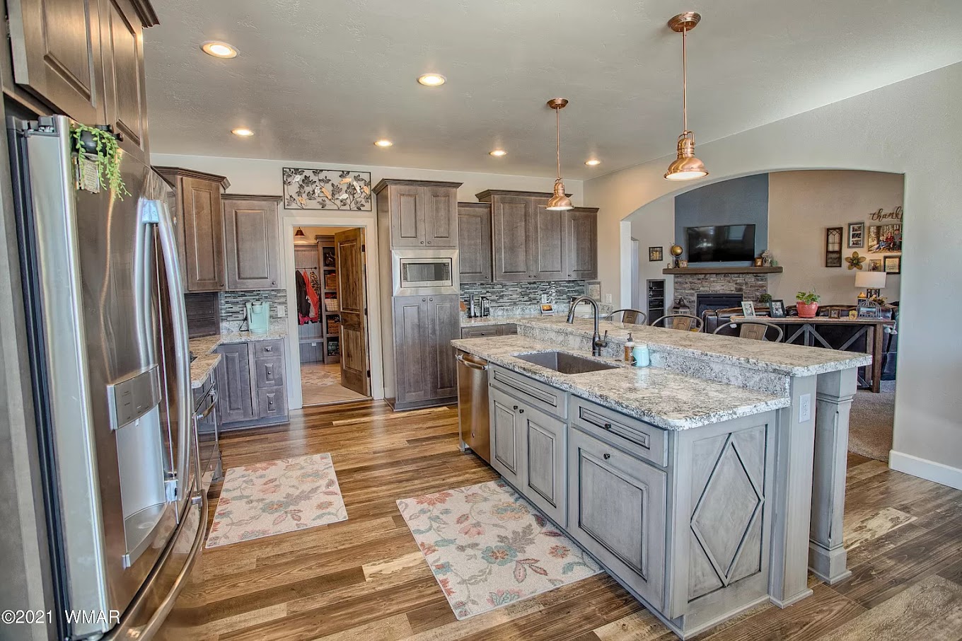 Custom kitchen with cabinetry and island in an LD & B custom home